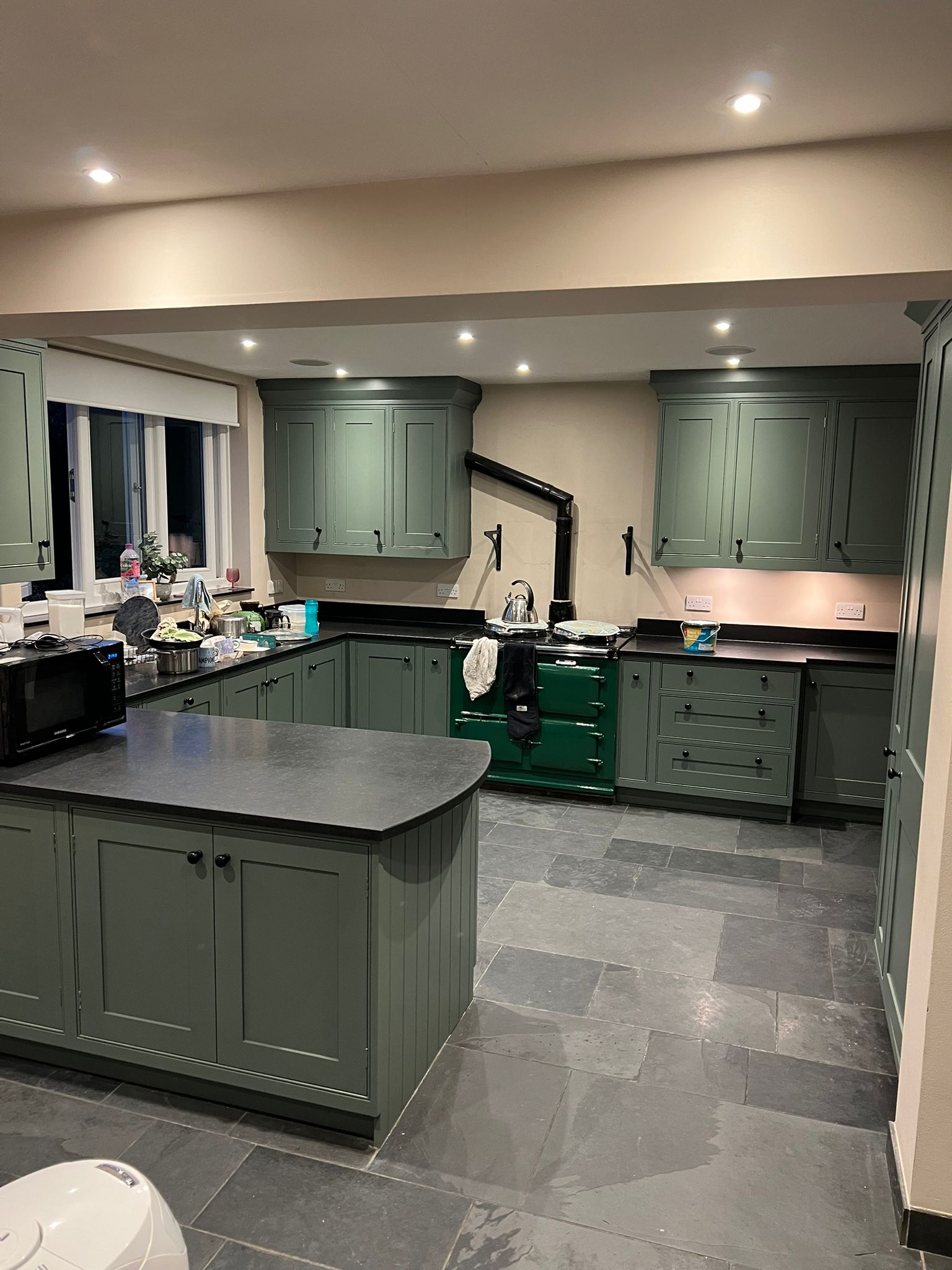 Smoke green hand painted kitchen cabinetry by Paul C Barber Decorations