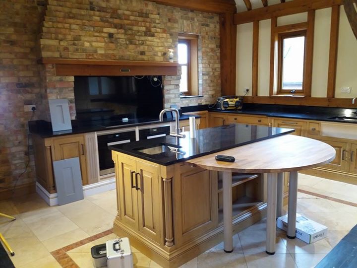 Before photo of dated oak kitchen before hand painted refurbishment