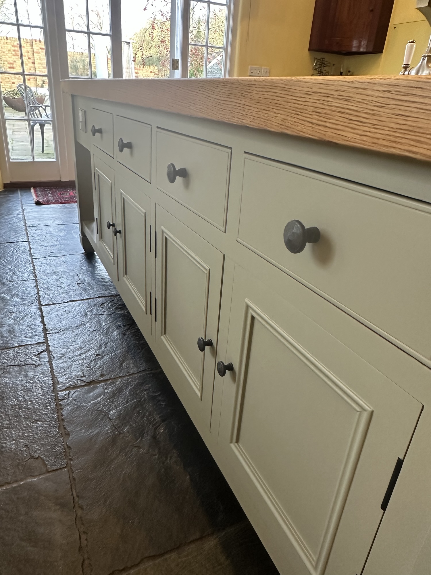 Finished kitchen after professional cabinet painting with a clean refined painted finish