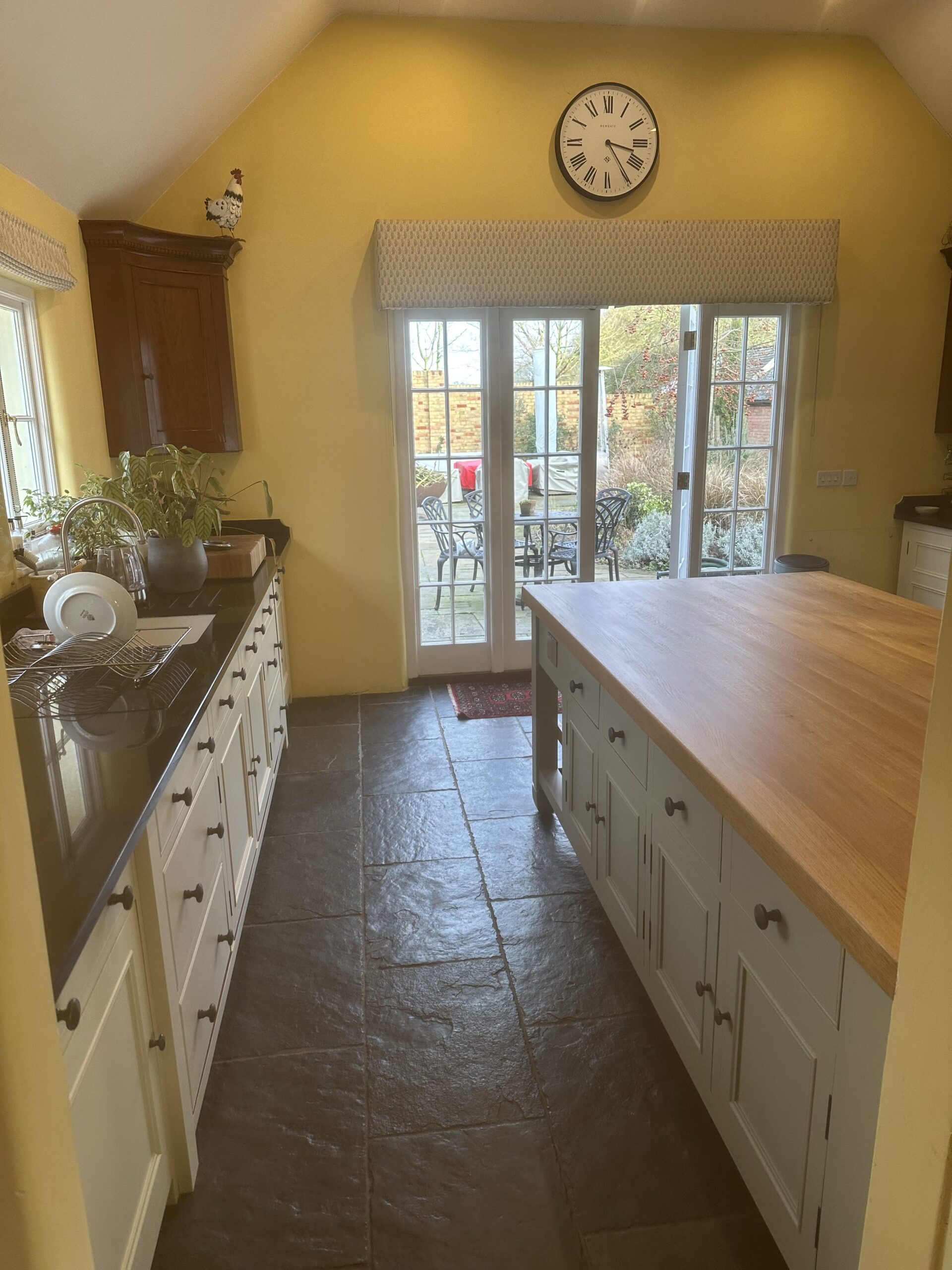 Hand painted Chalon kitchen cabinetry with a refined professional finish