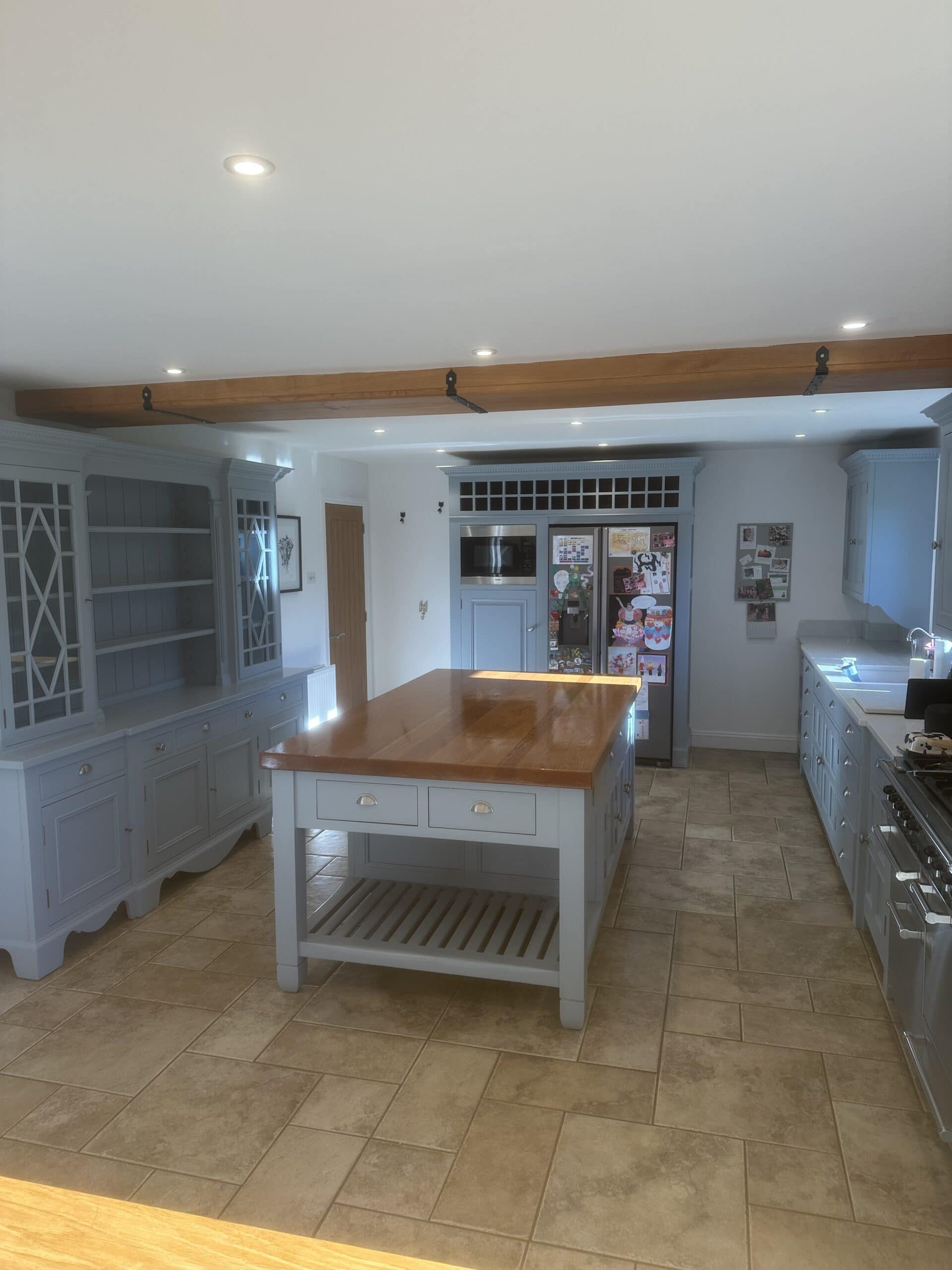 Chalon kitchen cabinetry refreshed in Neptune Flax Blue and Tikkurila Helmi 10